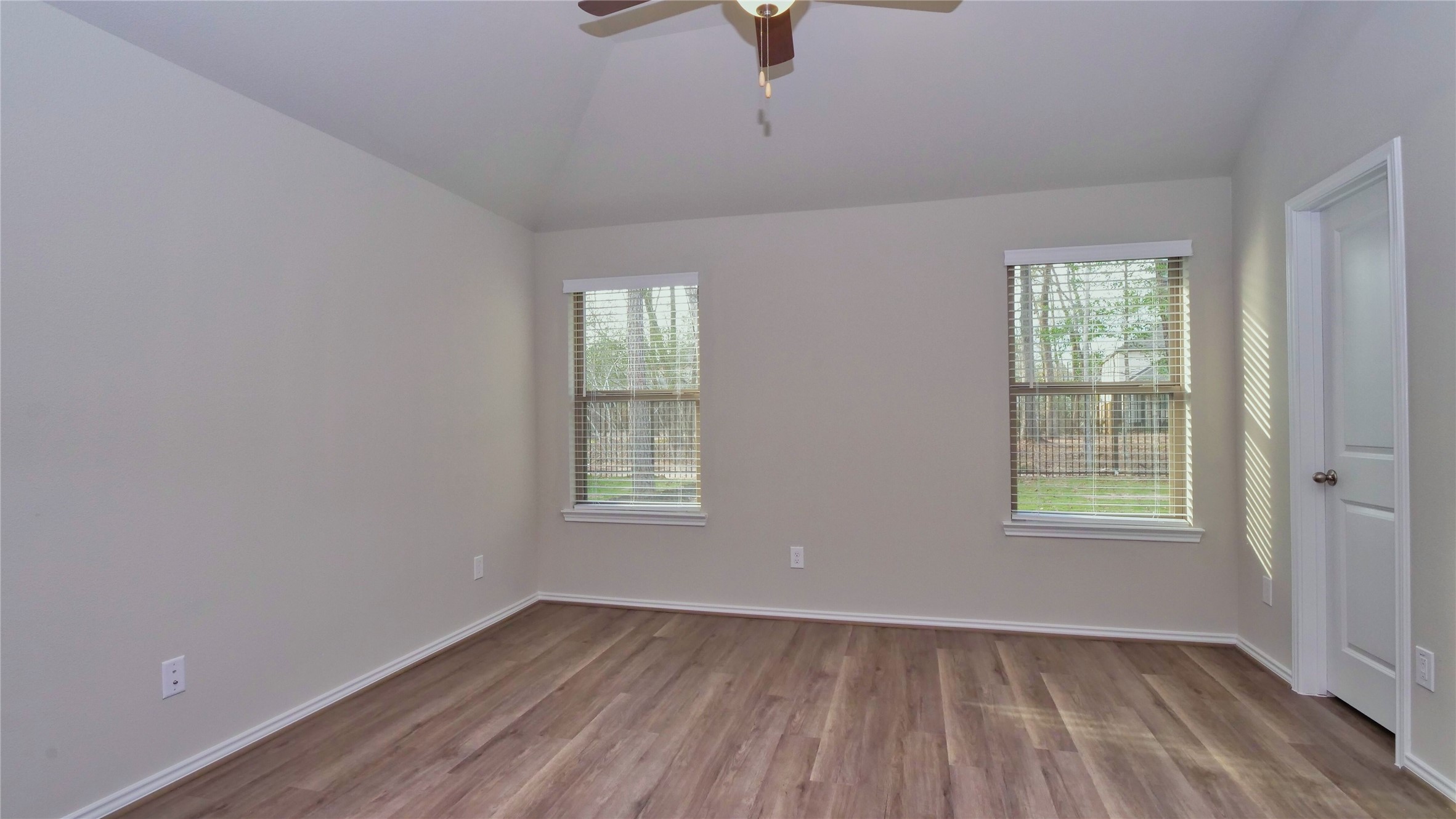 7343 Mount Greylock Loop Porter, TX 77365 - Photo 9 of 17 an empty room with windows