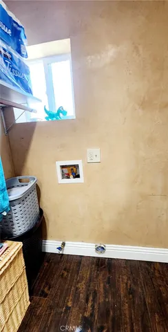 a kitchen with a sink and a refrigerator