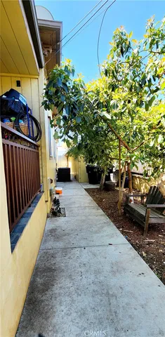 a view of a door of a house with wooden walls