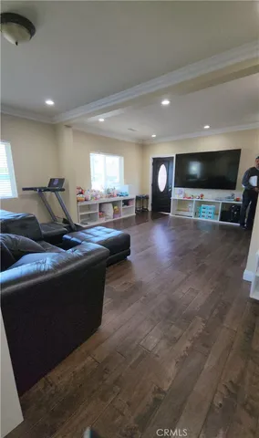 a view of entryway with wooden floor