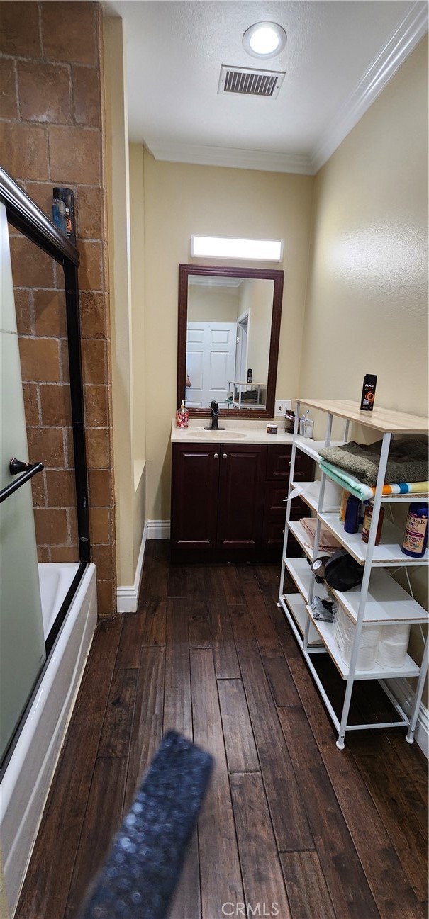 3112-3130 1st Street Riverside, CA 92507 - Photo 33 of 75 a room with a bed and a wooden floor