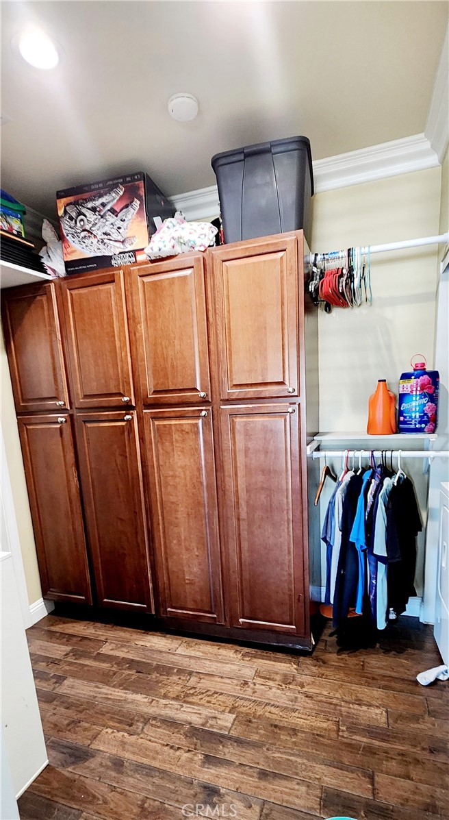 3112-3130 1st Street Riverside, CA 92507 - Photo 39 of 75 a view of walk in closet with clothes and shoes