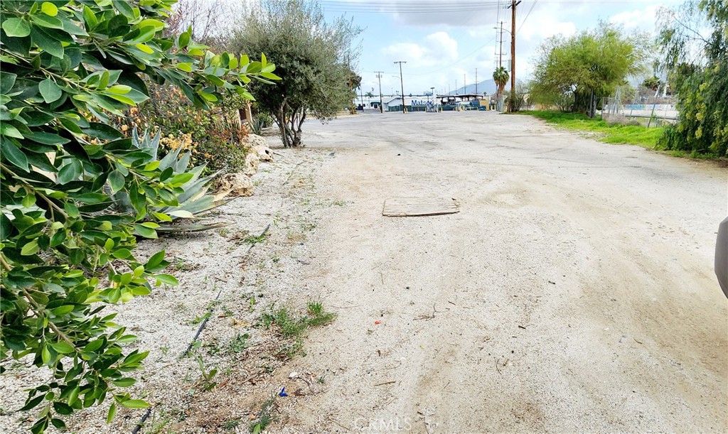 3112-3130 1st Street Riverside, CA 92507 - Photo 55 of 75 a view of a dirt road with a building in the background