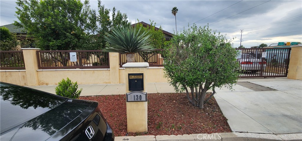 3112-3130 1st Street Riverside, CA 92507 - Photo 60 of 75 a view of a house with a yard