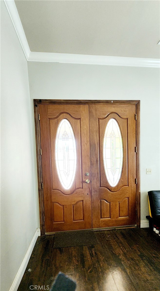 3112-3130 1st Street Riverside, CA 92507 - Photo 6 of 75 a view of a livingroom with wooden floor and a potted plant