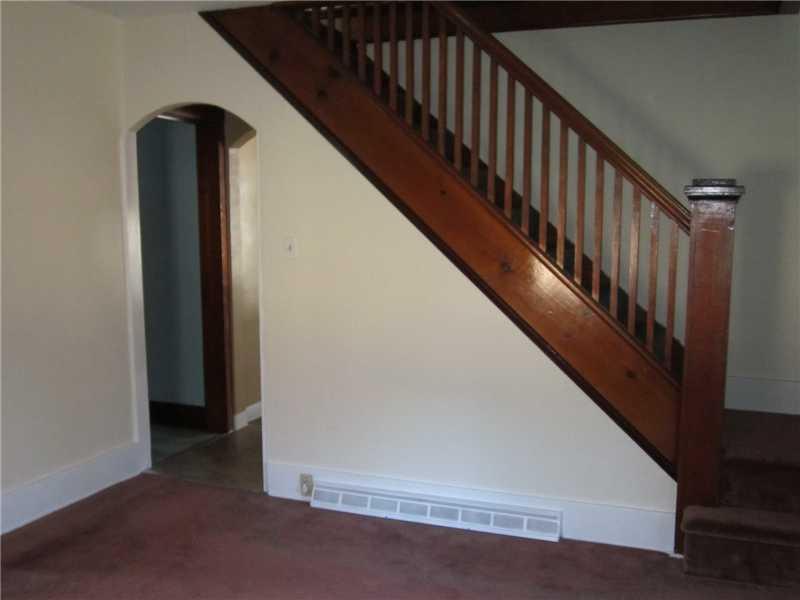 480 Kings Road Apollo, PA 15613 - Photo 7 of 23 Dining Room. Dining room view towards kitchen - glowing wooden stairway and bannister.