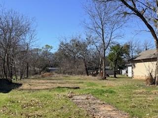 906 Virginia Street Graham, TX 76450 - Photo 1 of 4 a view of outdoor space with trees