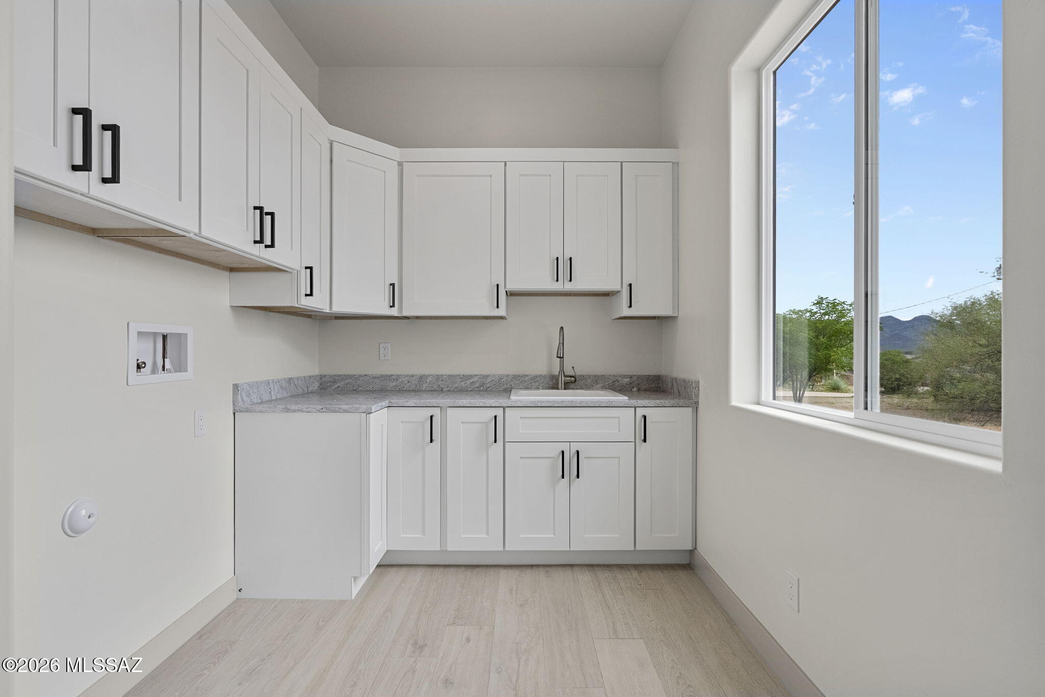 1557 Pinguinos Court Rio Rico, AZ 85648 - Photo 25 of 37 25. Large laundry room
