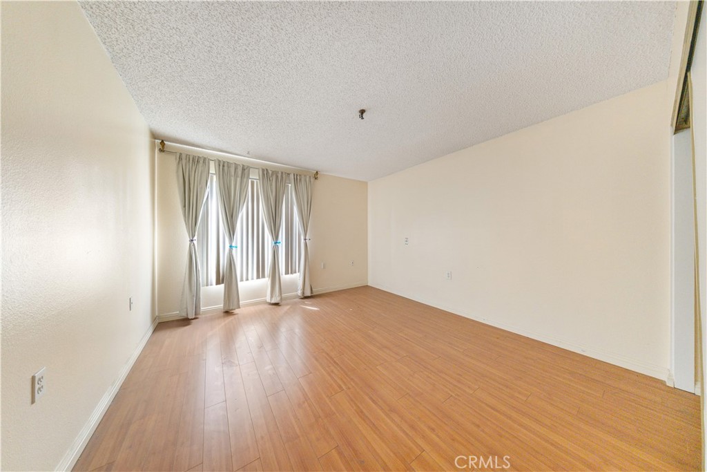 4501 Peck Road, Unit 76 El Monte, CA 91732 - Photo 22 of 35 a view of an empty room with wooden floor