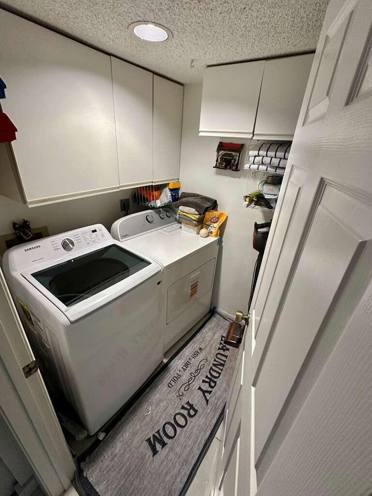13770 Oneida Drive, Unit B2 Delray Beach, FL 33446 - Photo 13 of 14 a utility room with dryer and washer
