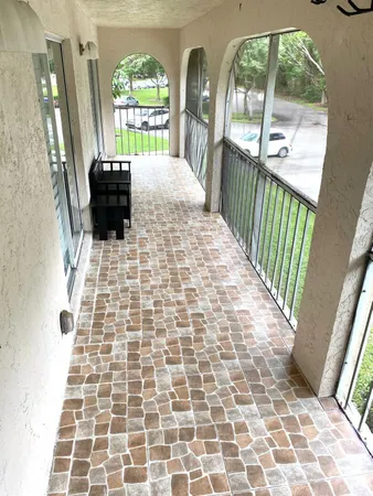 a view of empty room with windows