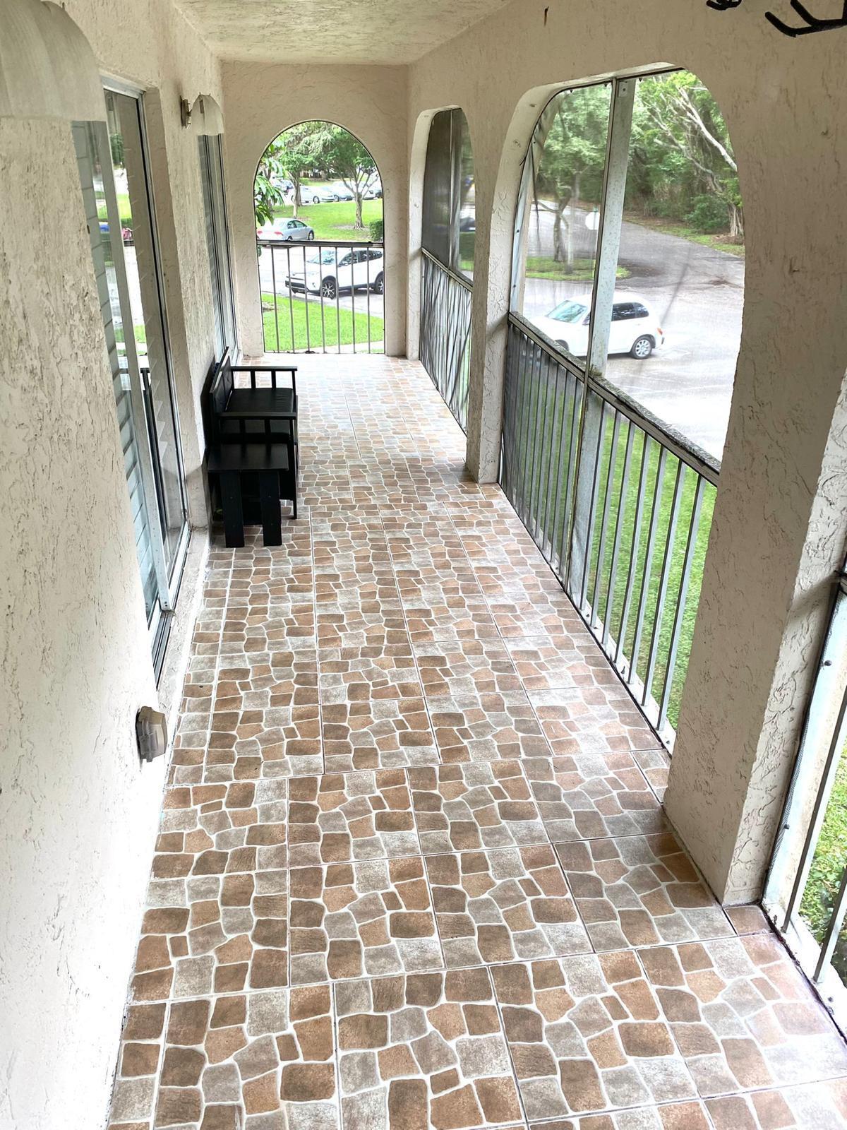 13770 Oneida Drive, Unit B2 Delray Beach, FL 33446 - Photo 14 of 14 a view of empty room with windows