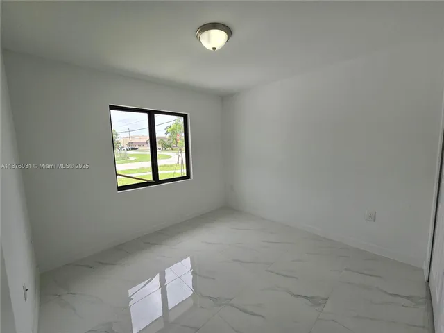 an empty room with a window