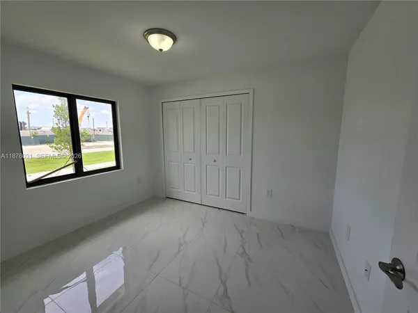 an empty room with windows