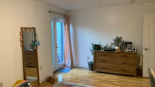 a room with a dresser