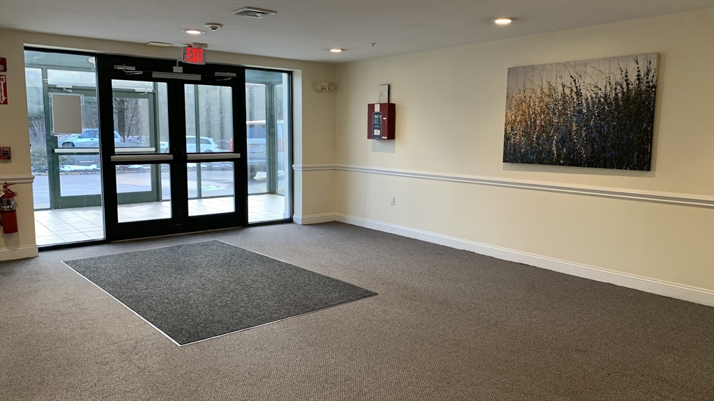 25 Alpine Street, Unit 10 Boston, MA 02136 - Photo 17 of 18 a view of an empty room with a window