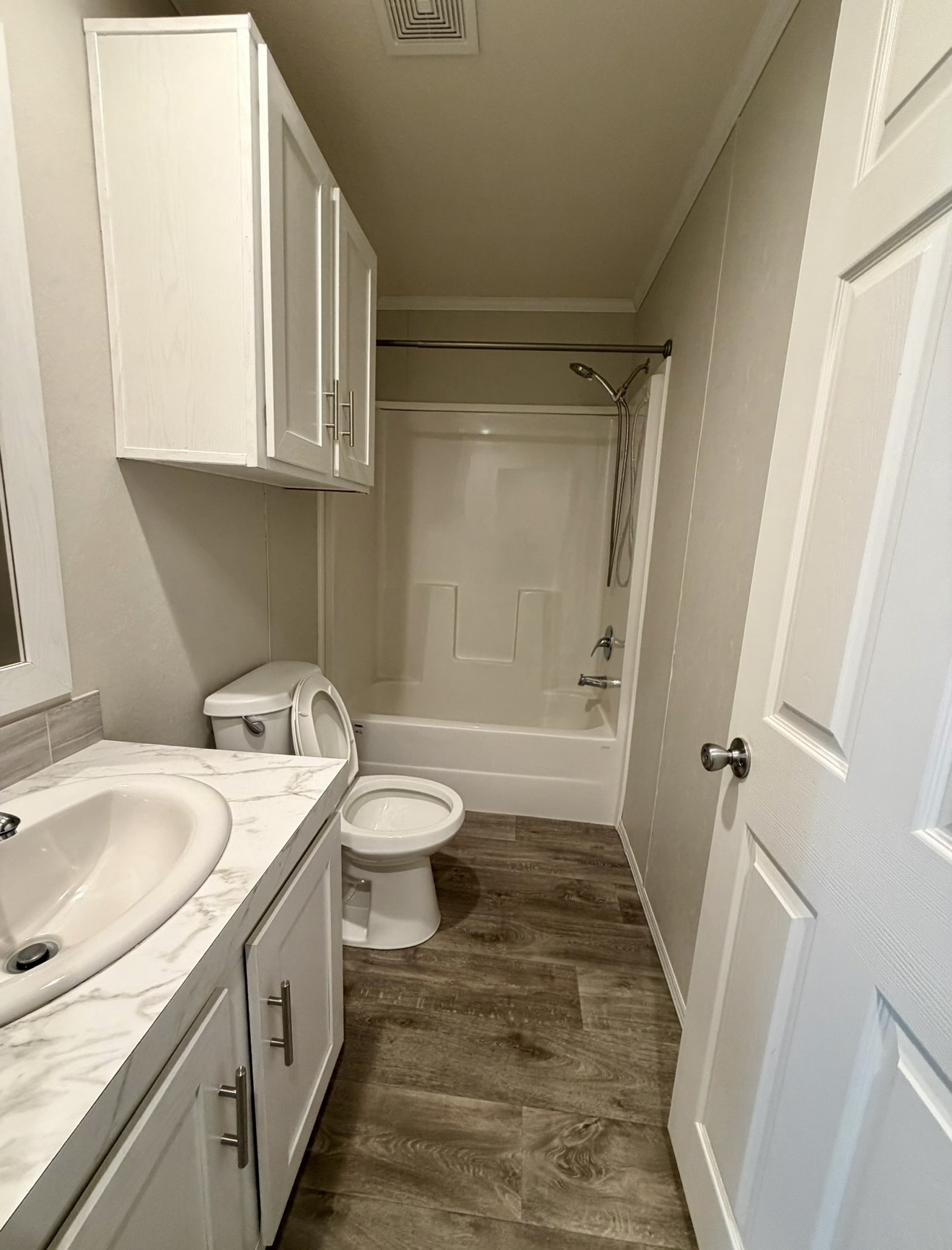 126 Castellana Way Elgin, TX 78621 - Photo 17 of 19 a bathroom with a sink a toilet and shower