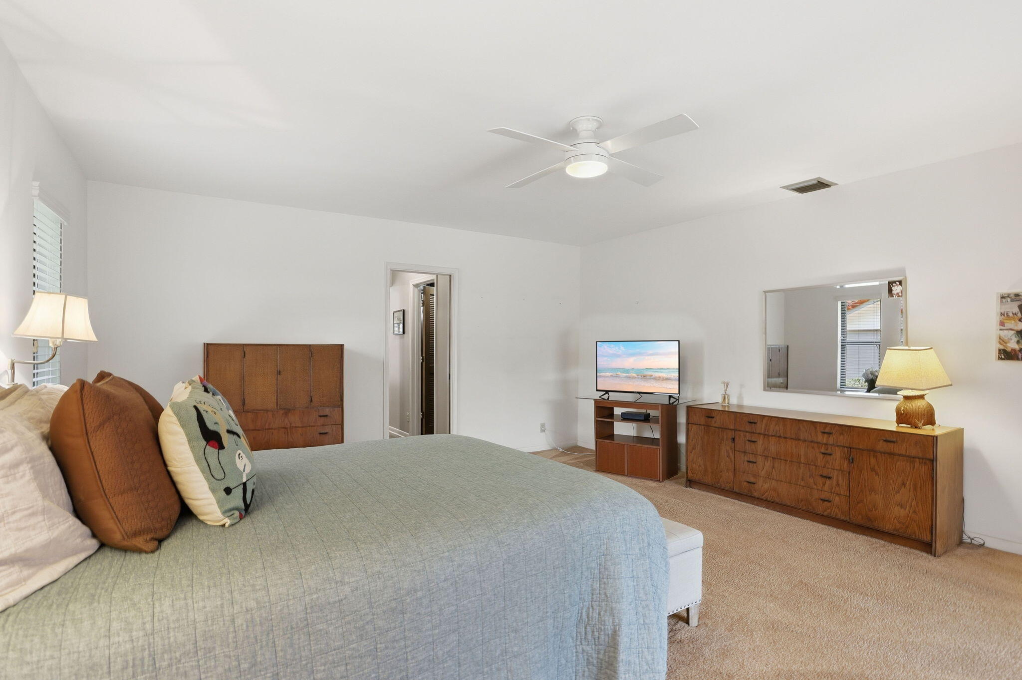 1960 Northwest 25th Street Boca Raton, FL 33431 - Photo 25 of 50 a bed room with a bed and dresser