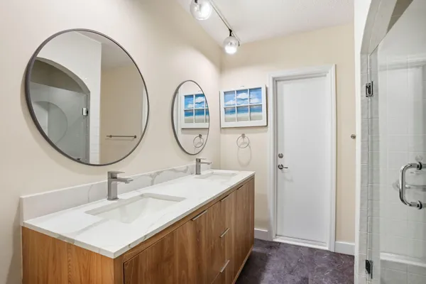 a bathroom with a sink and a mirror