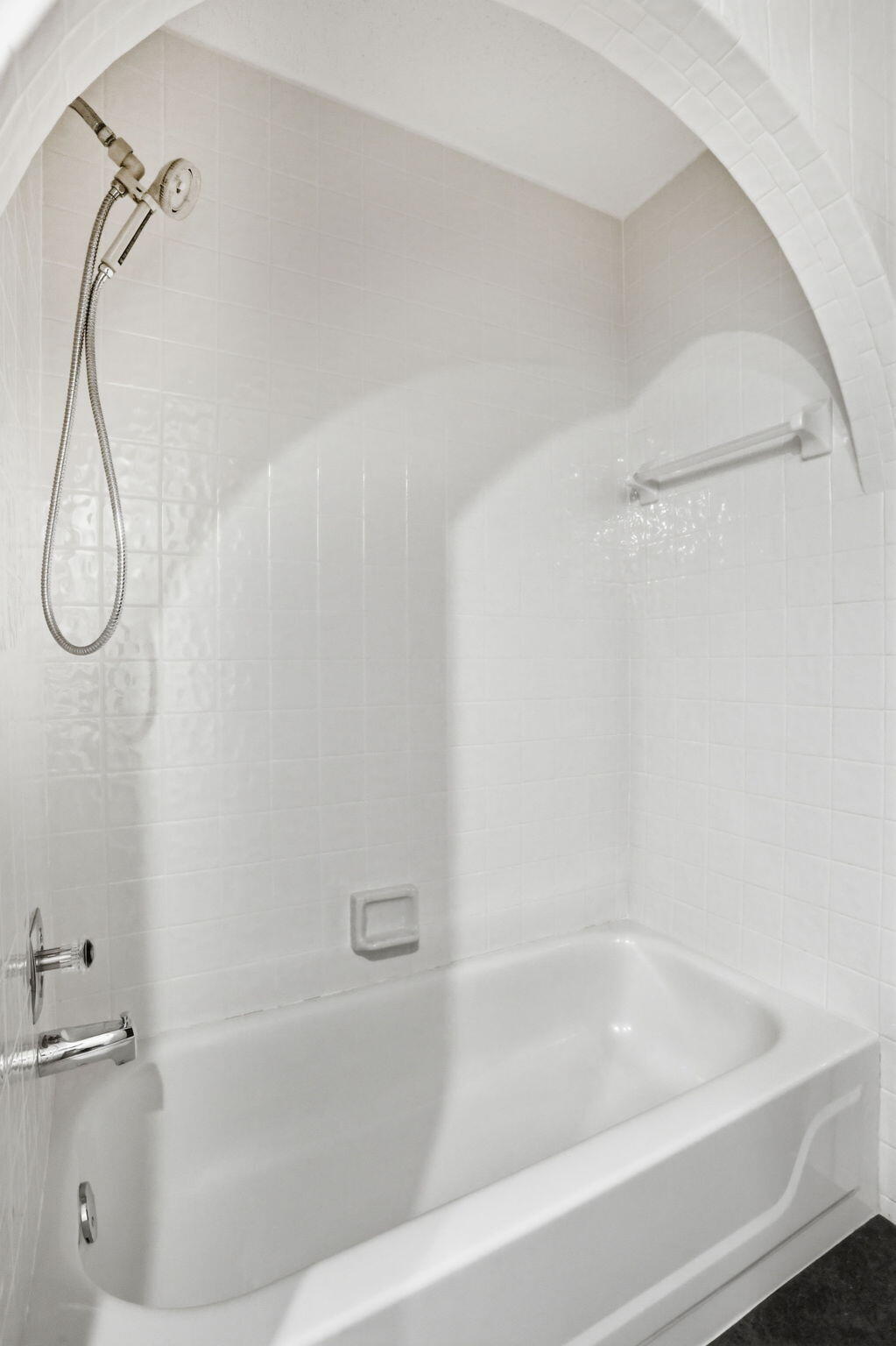 1960 Northwest 25th Street Boca Raton, FL 33431 - Photo 34 of 50 a bathroom with a bath tub with a shower