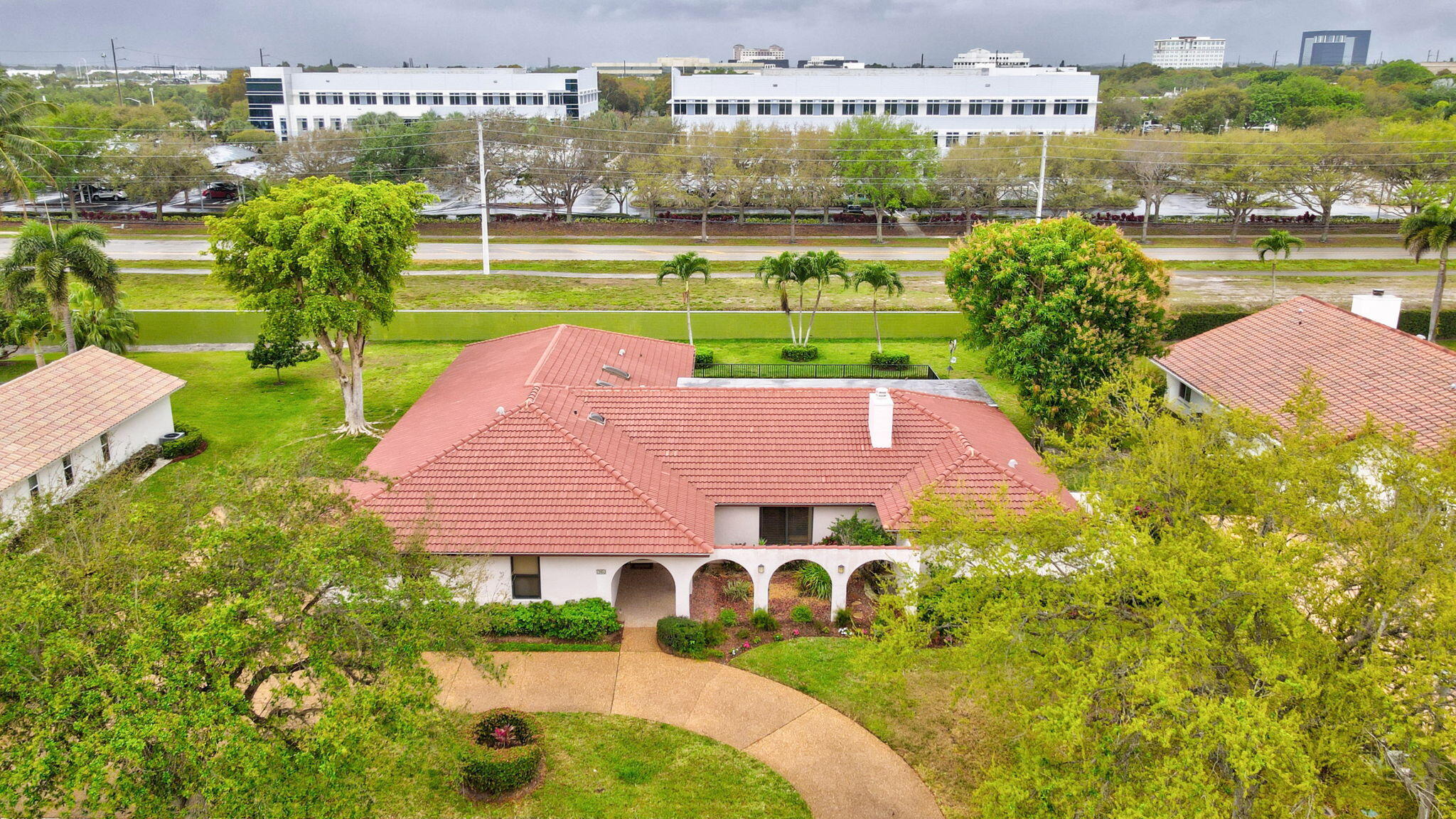 1960 Northwest 25th Street Boca Raton, FL 33431 - Photo 41 of 50 an aerial view of a house with a garden and lake view