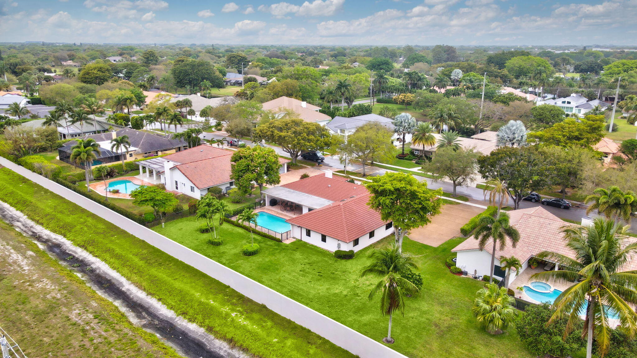 1960 Northwest 25th Street Boca Raton, FL 33431 - Photo 42 of 50 an aerial view of residential houses with outdoor space and street view