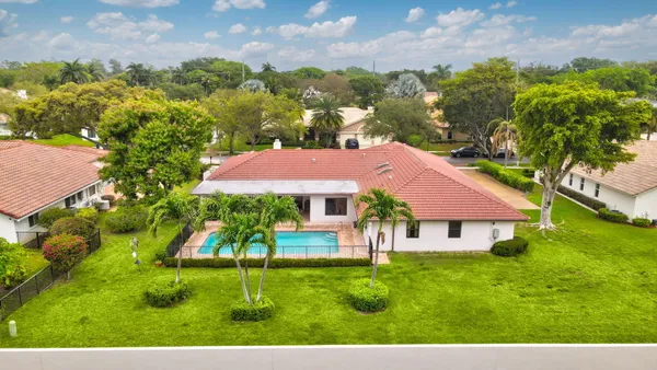 a view of a house with a garden