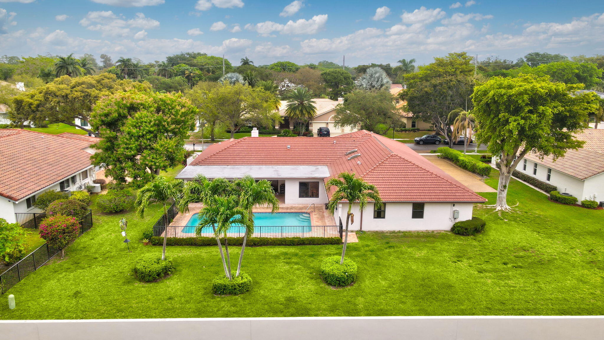 1960 Northwest 25th Street Boca Raton, FL 33431 - Photo 44 of 50 a view of a house with a garden