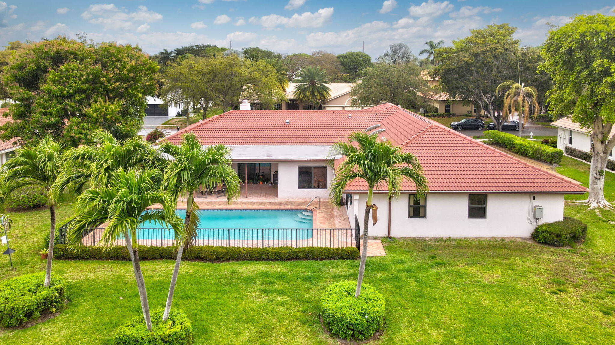 1960 Northwest 25th Street Boca Raton, FL 33431 - Photo 45 of 50 a front view of a house with a yard