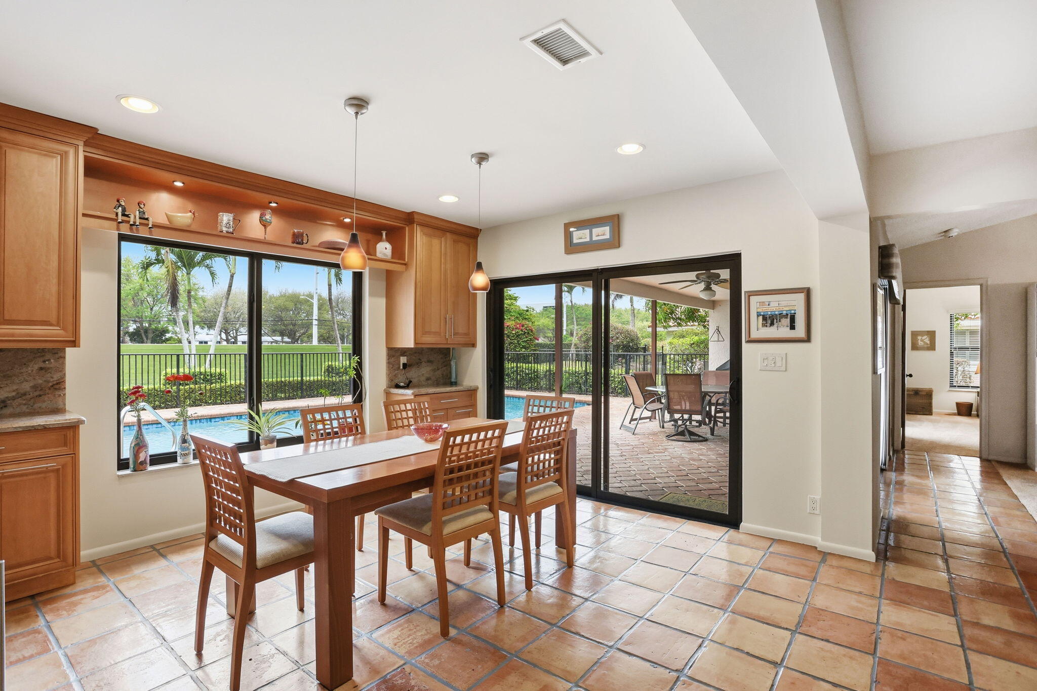 1960 Northwest 25th Street Boca Raton, FL 33431 - Photo 5 of 50 a view of a dining room with furniture window and outside view