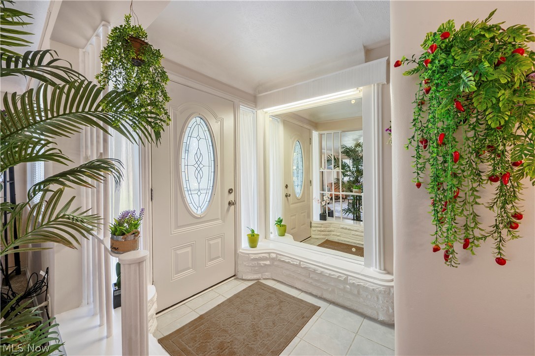 6597 York Road Parma Heights, OH 44130 - Photo 5 of 34 Tiled foyer featuring a healthy amount of sunlight