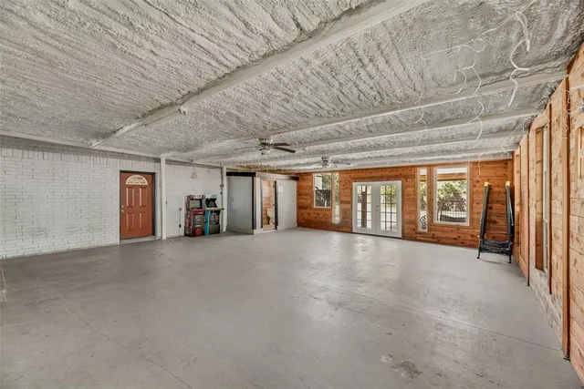 a view of an empty room with a fireplace