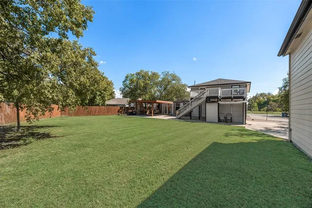 a view of a backyard with a garden