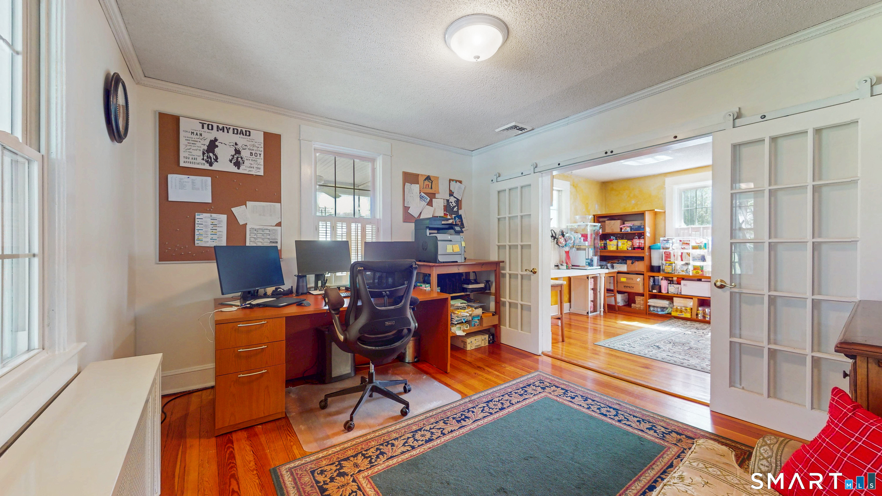40 Middlefield Street Middletown, CT 06457 - Photo 16 of 38 a workspace with furniture and a rug
