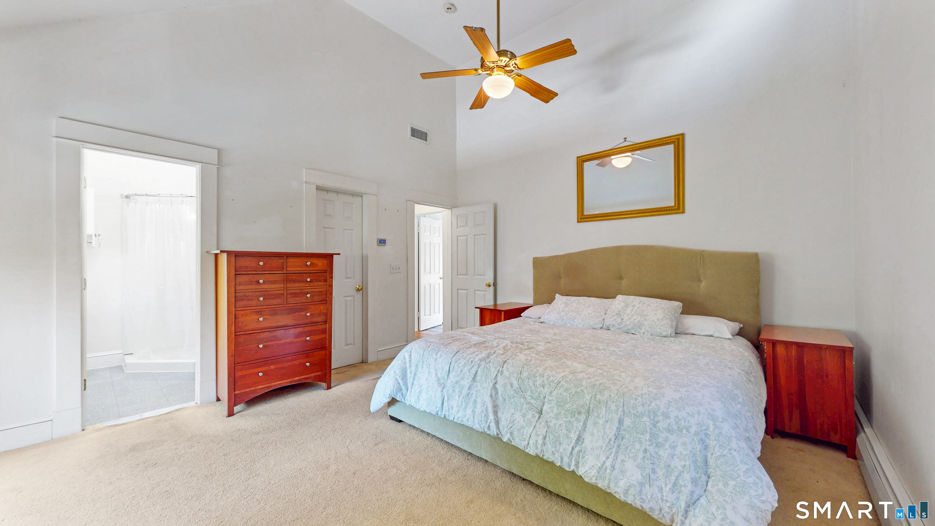 40 Middlefield Street Middletown, CT 06457 - Photo 26 of 38 a bedroom with a bed and a chandelier