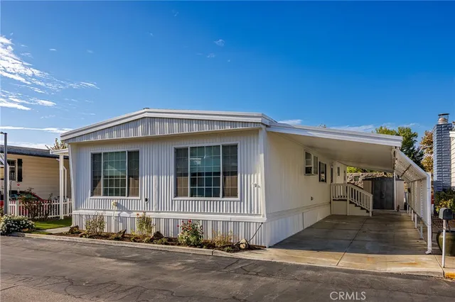 a front view of a house with a garage
