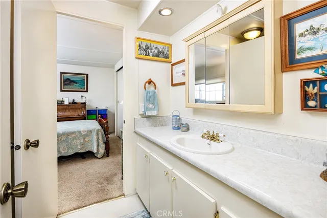 a kitchen with a stove and a refrigerator