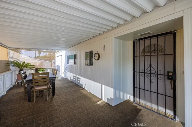 a view of a porch with furniture
