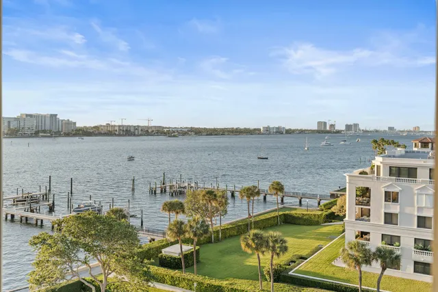 a view of a lake with building in front of it