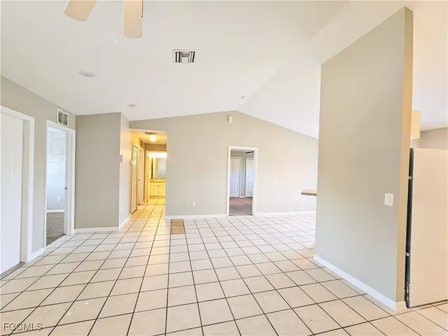 a view of an empty room and window