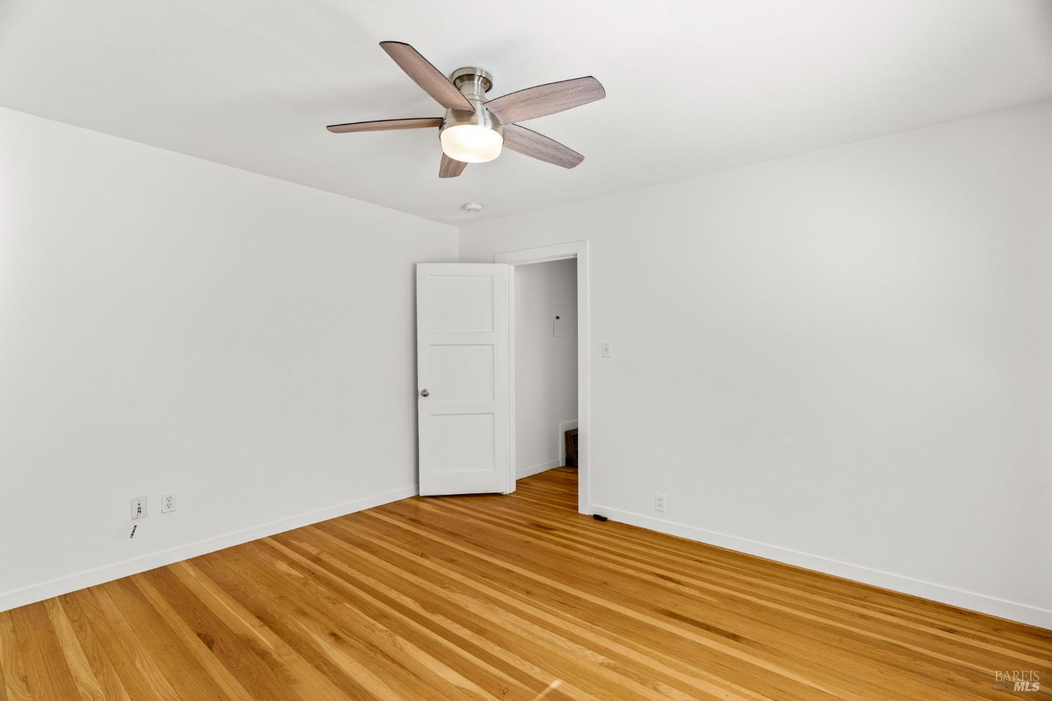 1225 Oakville Grade Road Oakville, CA 94558 - Photo 38 of 76 a view of empty room with wooden floor