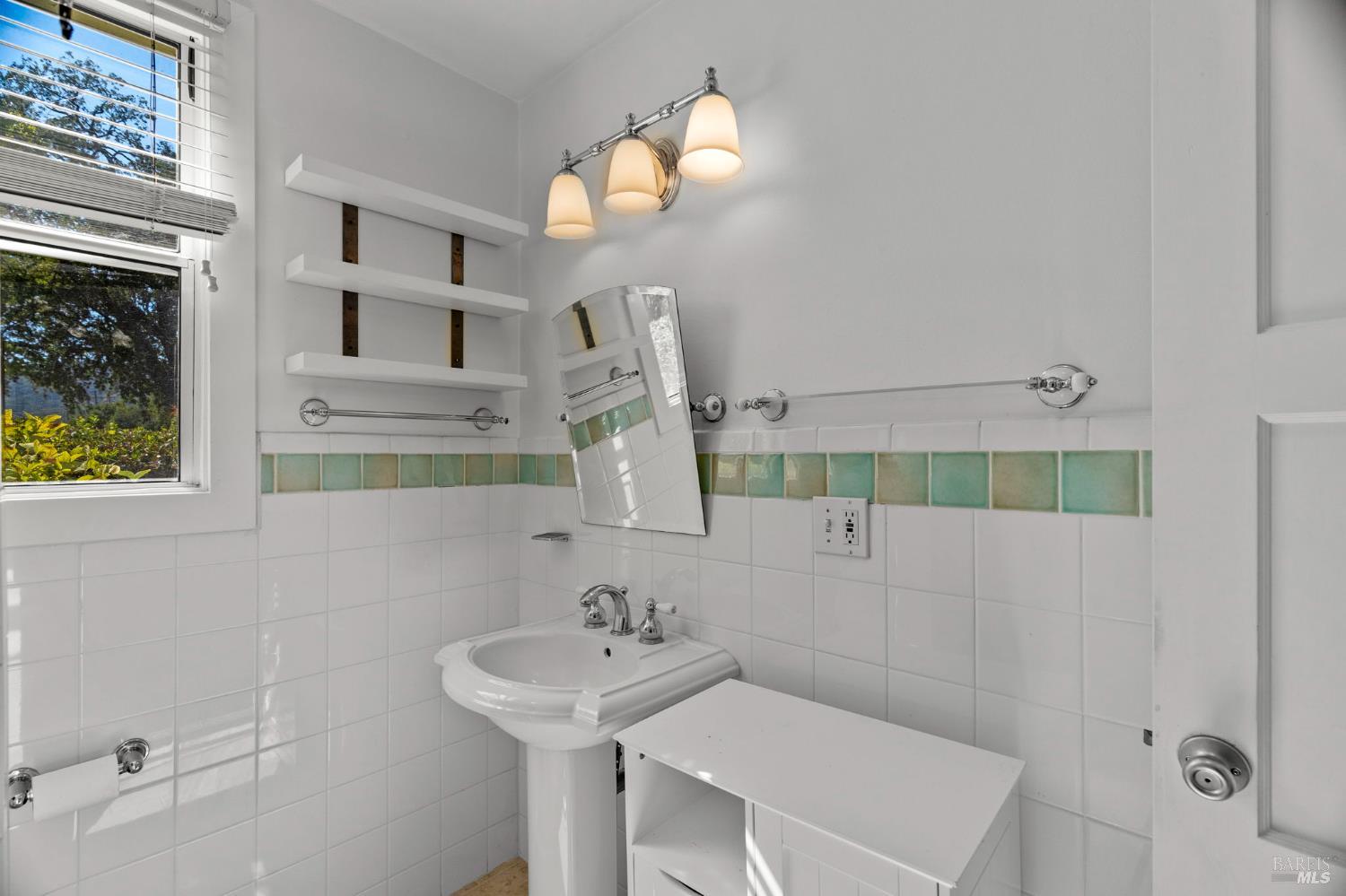 1225 Oakville Grade Road Oakville, CA 94558 - Photo 40 of 76 a bathroom with a sink a toilet and mirror