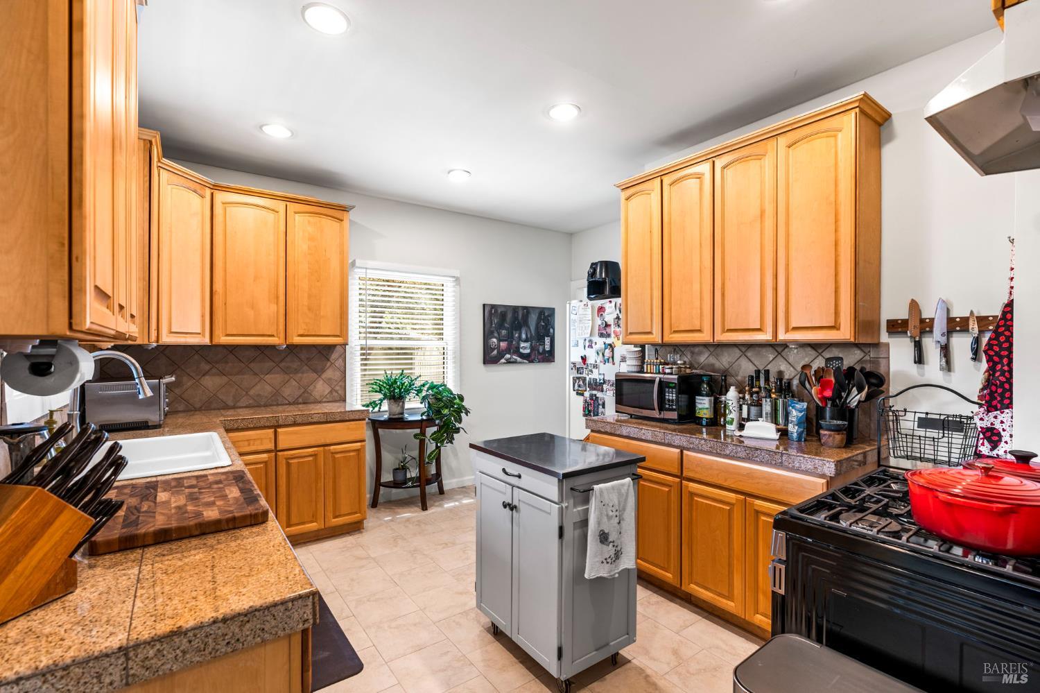 1225 Oakville Grade Road Oakville, CA 94558 - Photo 56 of 76 a kitchen that has a lot of cabinets in it