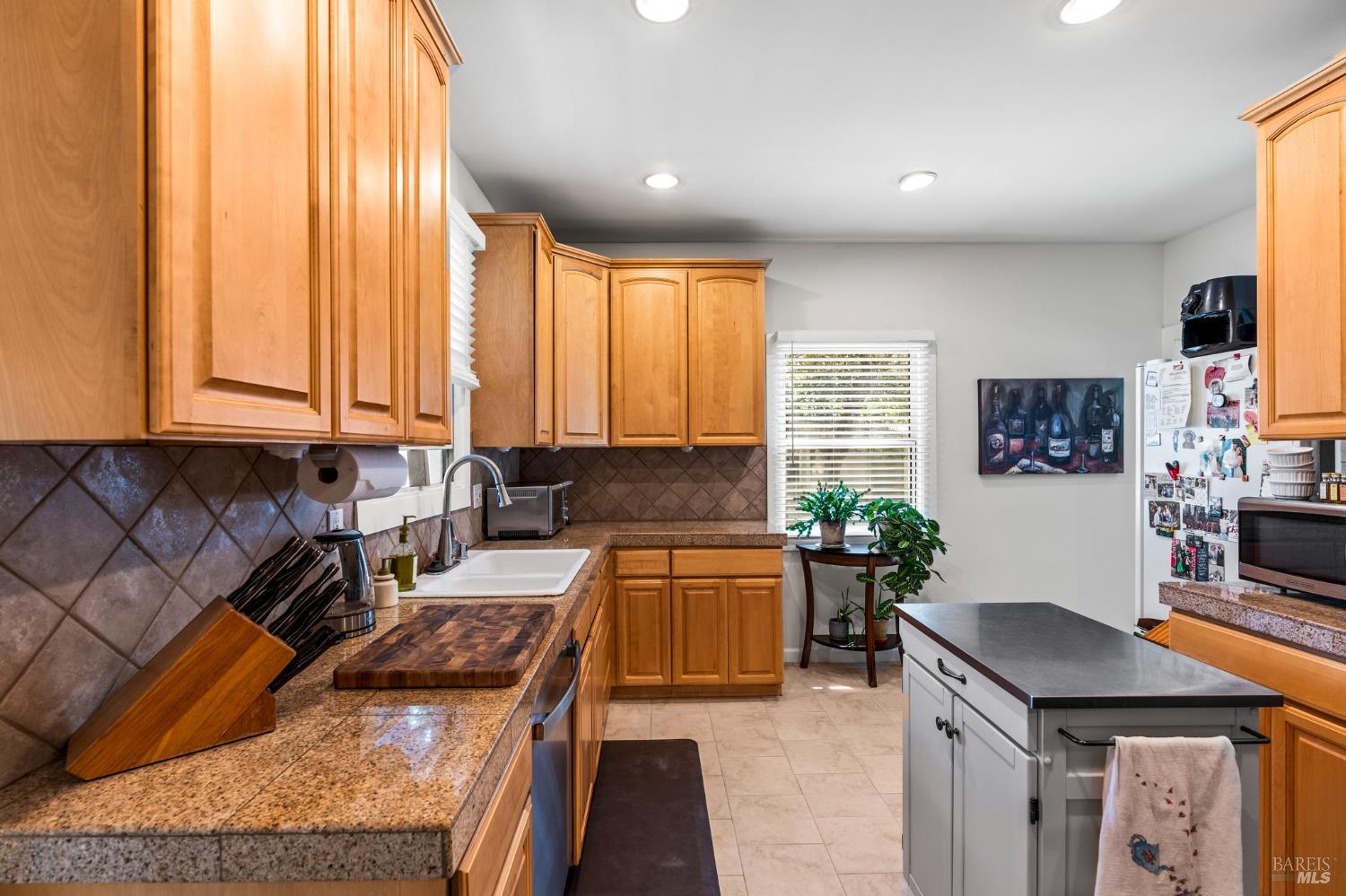 1225 Oakville Grade Road Oakville, CA 94558 - Photo 57 of 76 a kitchen with stainless steel appliances granite countertop a stove a sink and a microwave