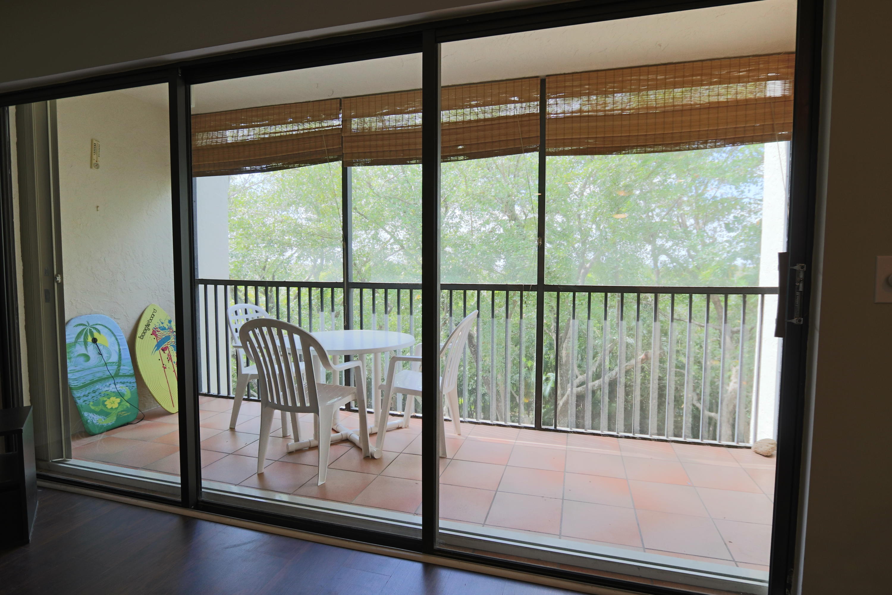 1605 Highway 1, Unit E402 Jupiter, FL 33477 - Photo 21 of 34 Screened In Enclosed Patio