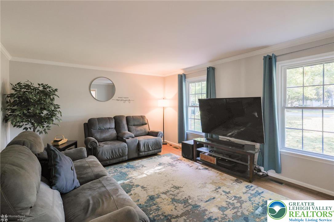 3657 Gramercy Place Bethlehem, PA 18020 - Photo 11 of 86 a living room with furniture and a flat screen tv
