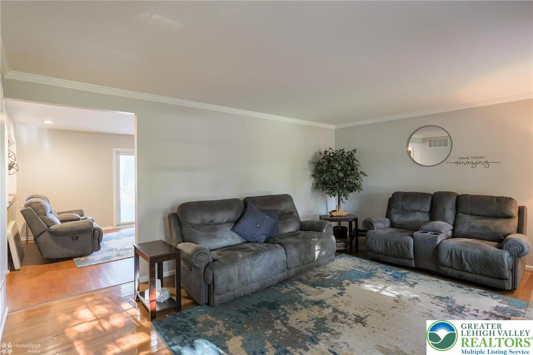 3657 Gramercy Place Bethlehem, PA 18020 - Photo 7 of 86 a living room with furniture and a couch