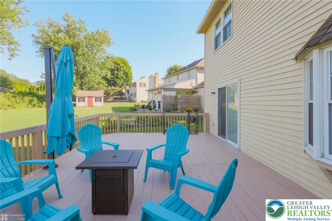 3657 Gramercy Place Bethlehem, PA 18020 - Photo 78 of 86 a view of a deck with a table and chairs next to a yard