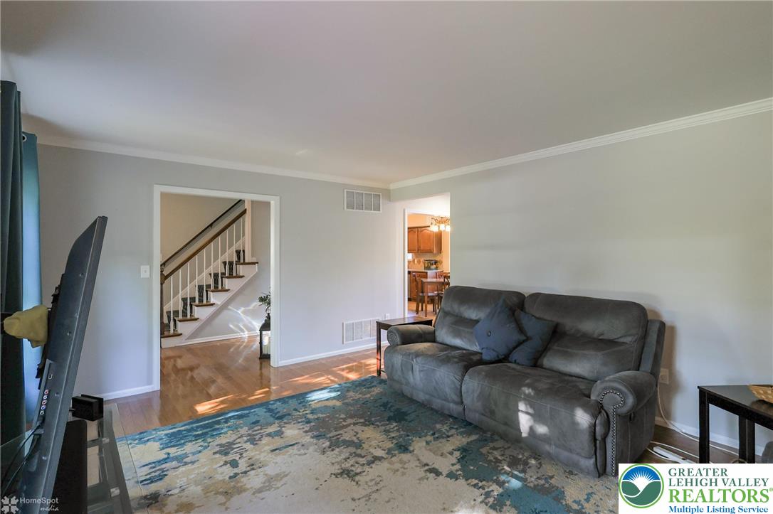 3657 Gramercy Place Bethlehem, PA 18020 - Photo 8 of 86 a living room with furniture and a flat screen tv