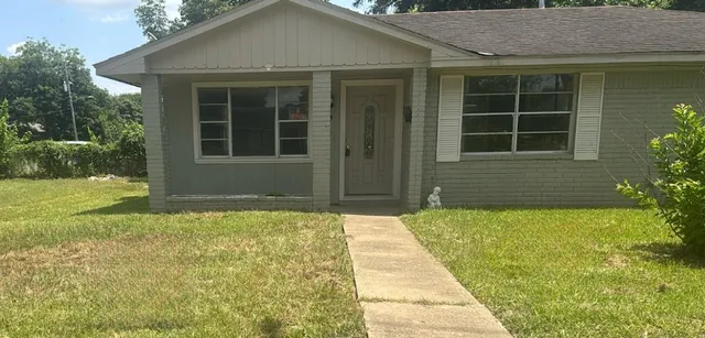 a front view of a house having yard